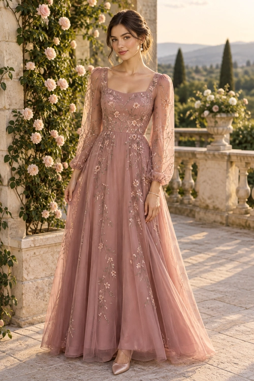 Dusty Rose Embroidered Gown A floor-length dusty rose gown with floral embroidery, a square neckline, and sheer puff sleeves, styled with matching heels.