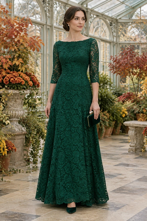 Emerald Lace Gown A woman wears a floor-length emerald lace gown with three-quarter sleeves, matching heels, and a dark clutch.